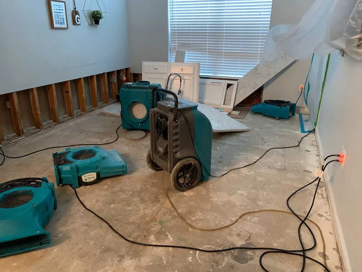 Dehumidifier in flood-cut room for Water Damage Restoration in Sheridan